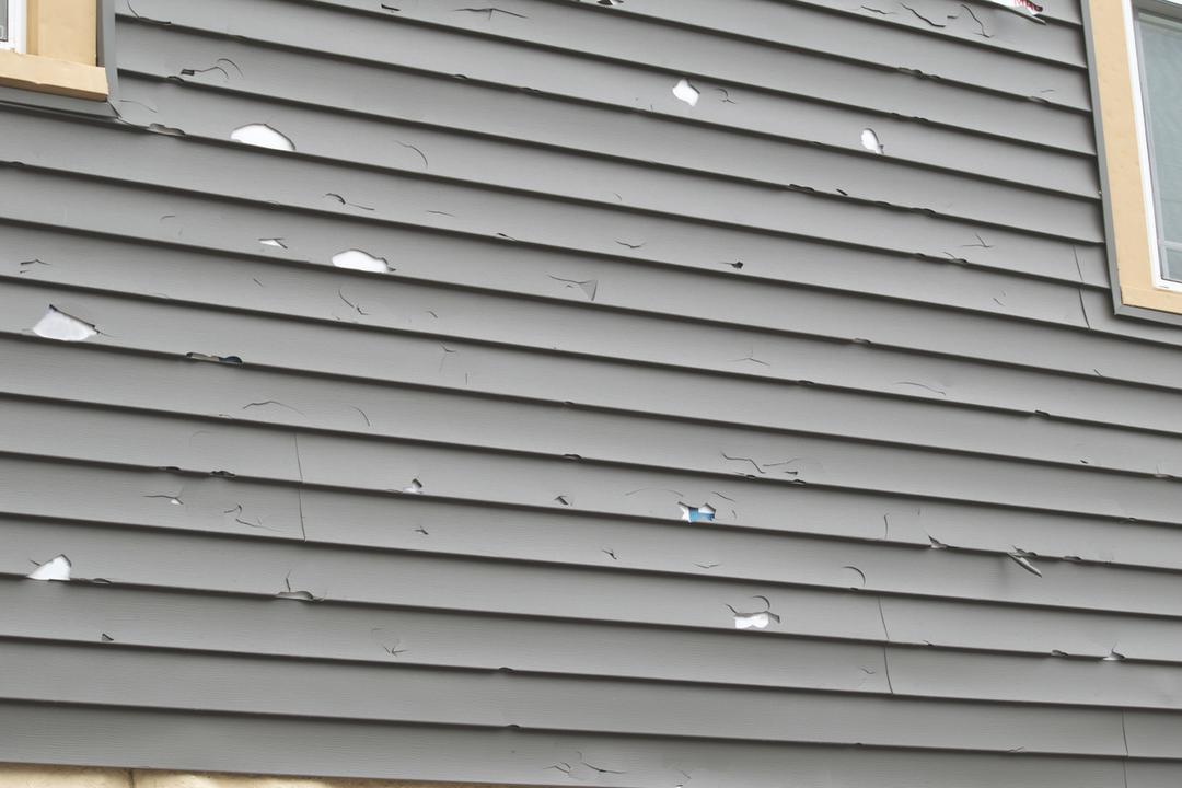 Siding removal and inspection by AMH Construction